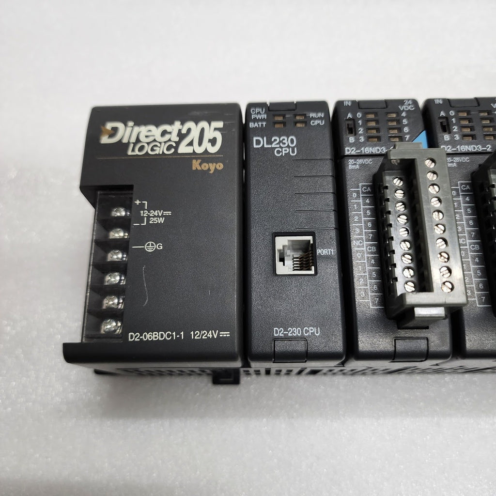 DIRECT LOGIC 205 KOYO PLC DL230 CPU D2-16ND3-2 IN D2-16TD2-2 OUT D2-06BDC1-1