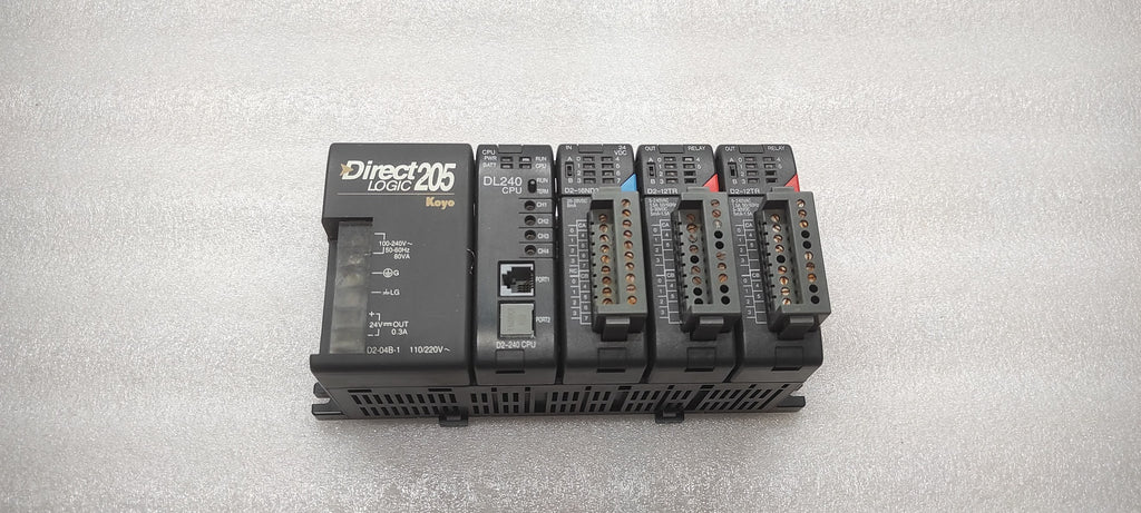 KOYO DIRECT LOGIC 205 PLC D2-04B-1 PS D2-240 CPU D2-16ND3-2 IN D2-12TR OUT