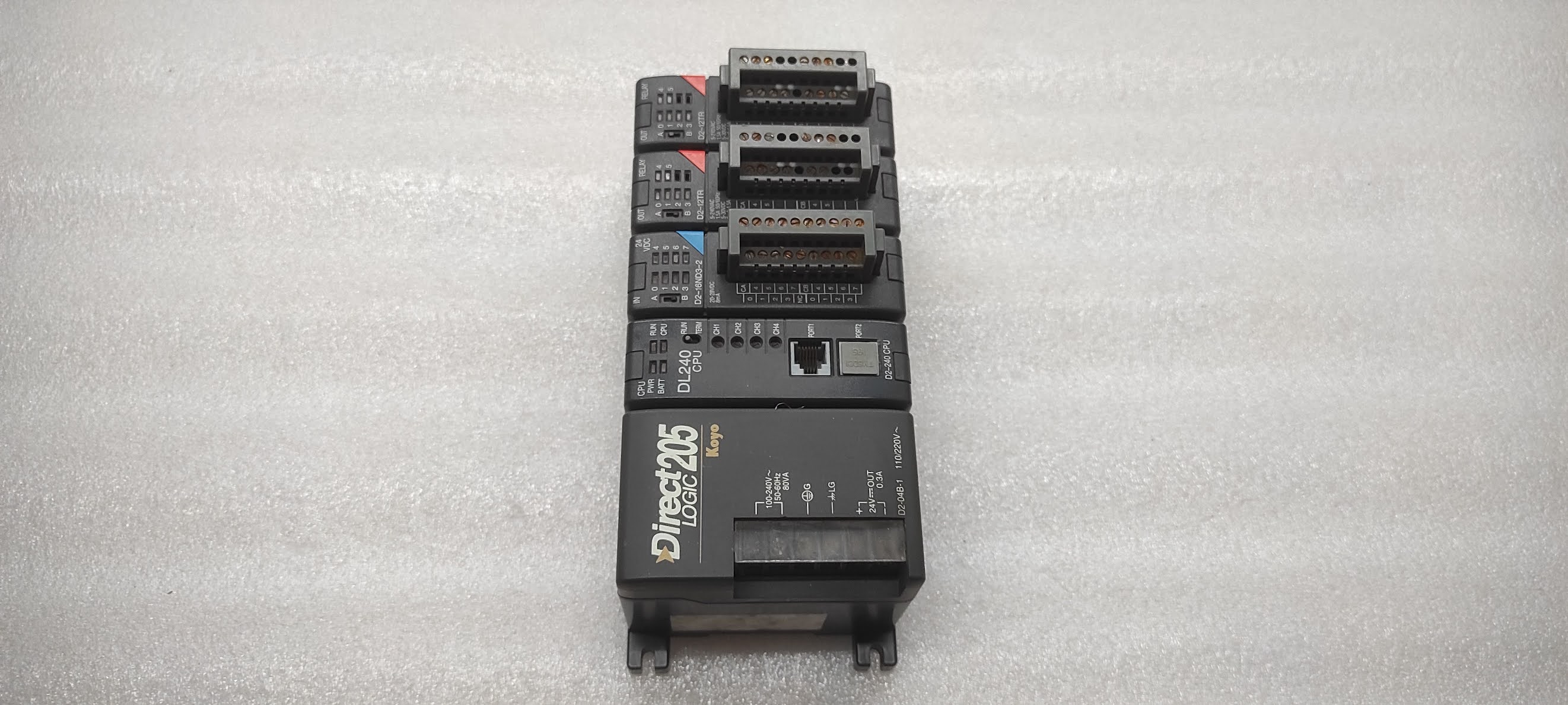 KOYO DIRECT LOGIC 205 PLC D2-04B-1 PS D2-240 CPU D2-16ND3-2 IN D2-12TR OUT