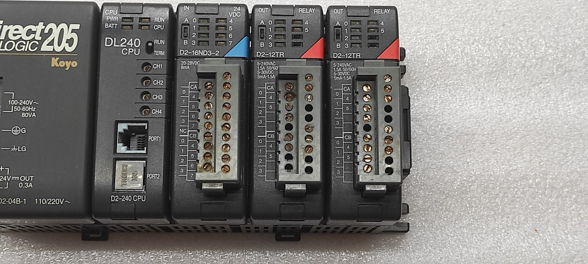 KOYO DIRECT LOGIC 205 PLC D2-04B-1 PS D2-240 CPU D2-16ND3-2 IN D2-12TR OUT